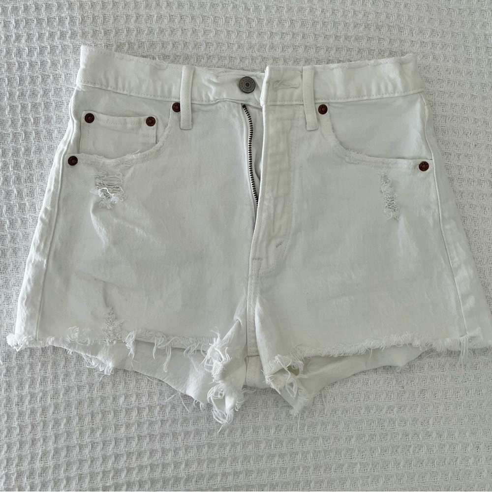 White distressed denim shorts
